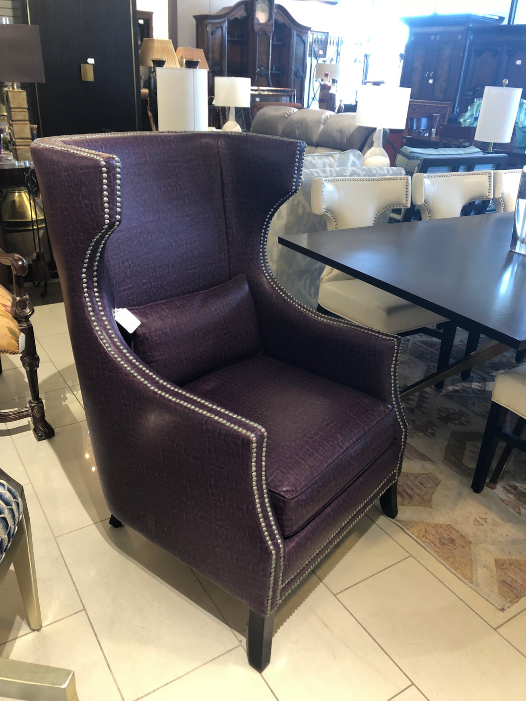 2 Purple Leather Chairs - Sold